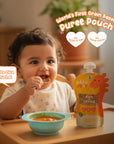 Baby eating Rorosaur Rice O Lentils puree that tastes like khichdi, made with no sugar, salt, or preservatives.