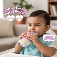 Baby enjoying Rorosaur Wheat-y Ragi puree pouch with no sugar, no preservatives, made from ragi, wheat, and banana.