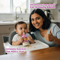 Mother feeding Rorosaur Wheat-y Ragi puree to baby, showing wholesome nutrition and complete meal for infants.