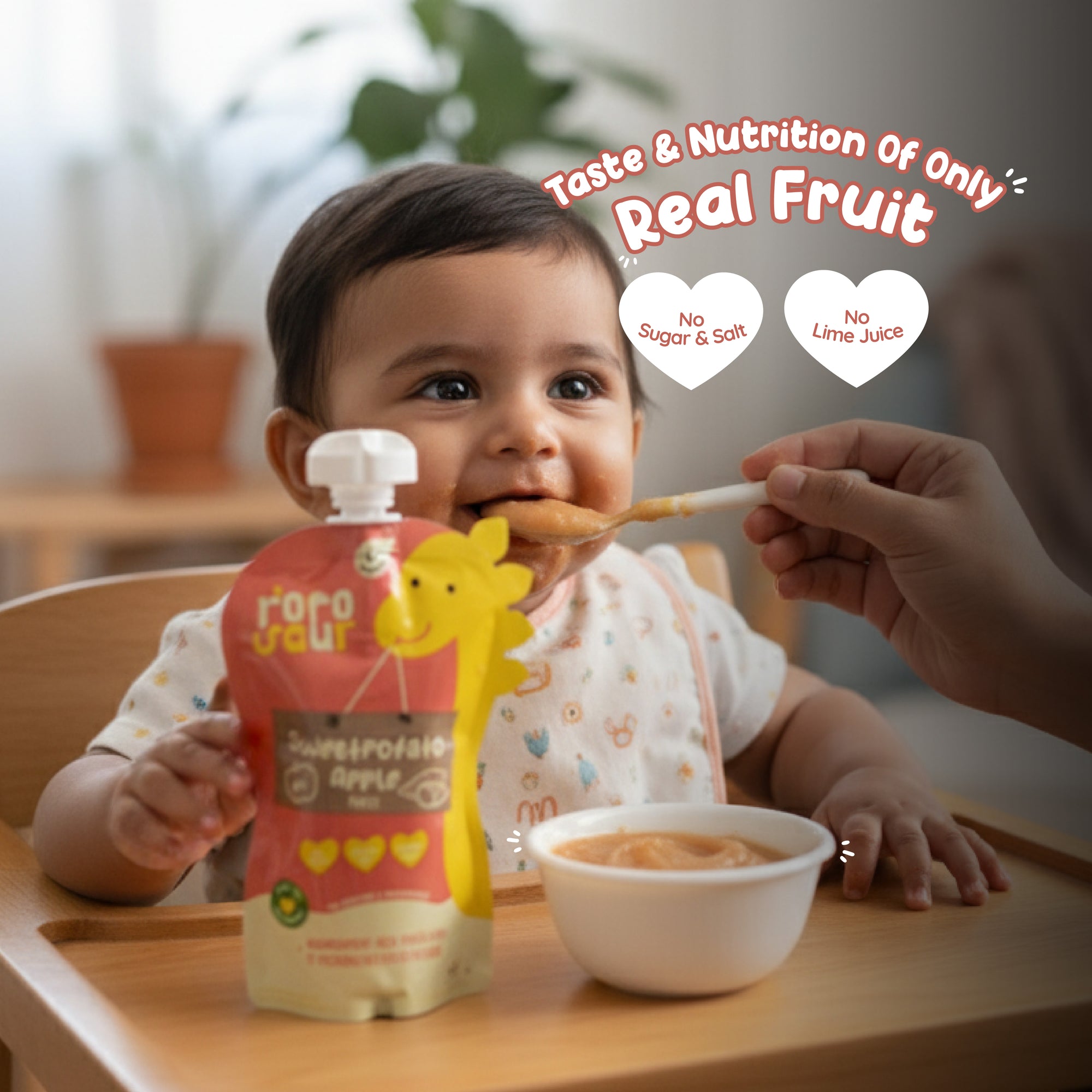 Baby eating Rorosaur Sweetpotato Apple puree pouch made with real fruit and no sugar, salt, or lime juice.